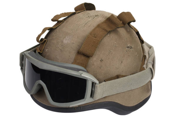 istock kevlar helmet with camouflage cover and protective goggles 912295908