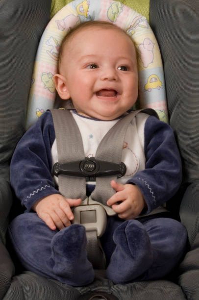 istock Baby in a Car Seat 912302530