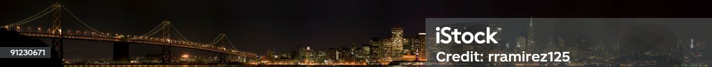 San Francisco skyline at night This is the view of the San Francisco Skyline from treasure Island, very big file, zoom in for details you will be able to see people on the building windows. Bay of Water Stock Photo