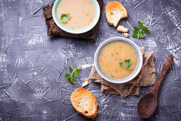 istock Healthy vegetarian peas soup on concrete background 912307470