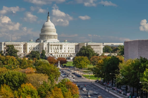 United States Capitol Building and Pennsylvania Avenue in Washington, DC - 4k/UHD View down Pennsylvania Avenue toward the West Facade of the U.S. Capitol Building in Washington, DC. Autumn Season. house of representatives photos stock pictures, royalty-free photos & images