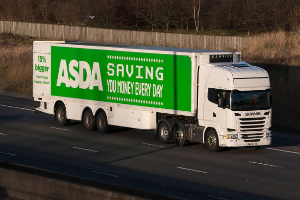 Asda superstore Lorry Redborn, UK - January 25, 2018: Lorry belonging to the British Asda Superstore in motion on motorway M1 asda photos stock pictures, royalty-free photos & images