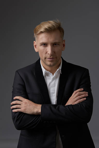istock Close-up businessman portrait with hands crossed 912319082