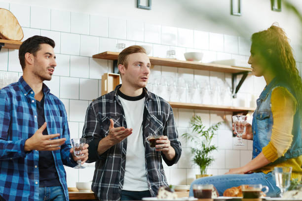 istock Puzzled men shocked with friends news 912322838