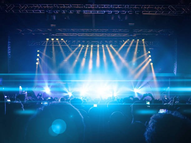 istock Concert crowd in front of a live stage 912323092