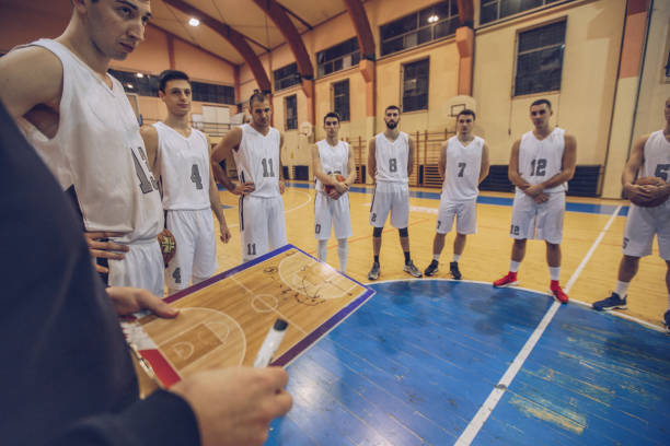 istock Basketball team on time out 912325702