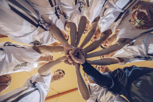 istock Men basketball team unity 912326660