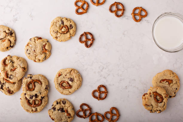 istock Chocolate chips and pretzels cookies on a marble table 912326704
