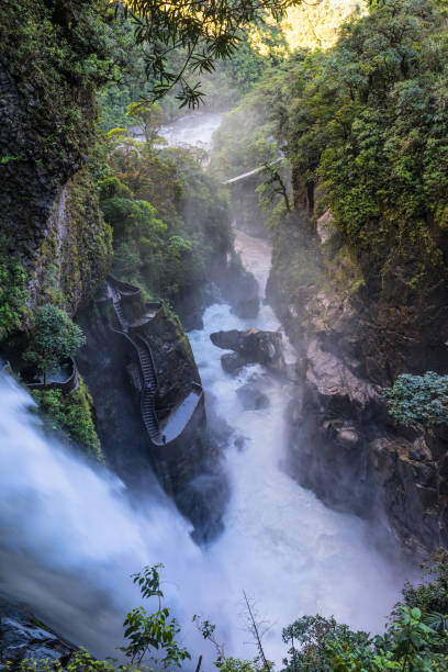 istock Devil's Cauldron waterfall (spanish: Pailon del Diablo) - Mountain river and fall in the Andes. Banos. Ecuador 912326858