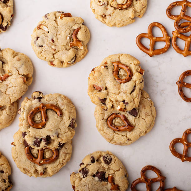 istock Chocolate chips and pretzels cookies on a marble table 912327040