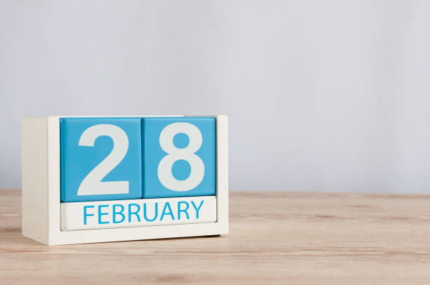 istock February 28th. Cube calendar for february 28 on wooden surface with empty space For text. Not Leap year or intercalary day 912332962