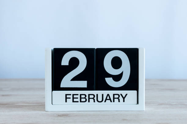 istock February 29th. Cube calendar for february 29 on wooden desk with empty space For text. Leap year, intercalary day 912332998
