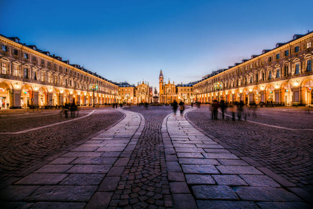 Main View of San Carlo Square and Twin Churches at Night, Turin Main View of empty San Carlo Square and Twin Churches at Night, Torino, Italy turin stock pictures, royalty-free photos & images