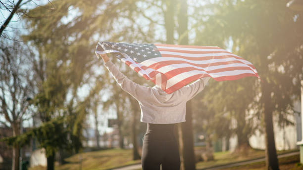 istock Woman athete with American flag 912337728