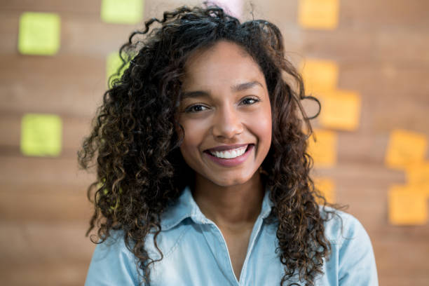 istock Portrait of a woman working at a co-working space 912337882