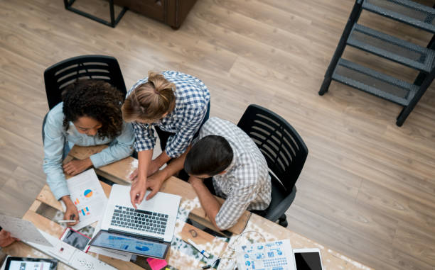 istock Happy group of people working together at a creative office 912337934