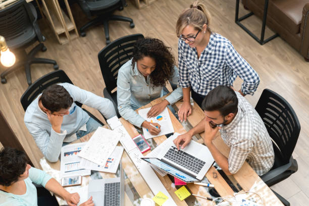 istock Group of workers in a business meeting at a creative office 912338014