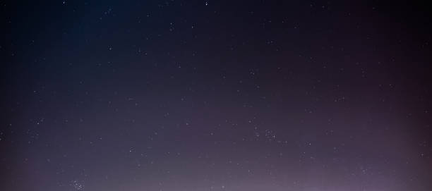 istock city night sky stars 912338032