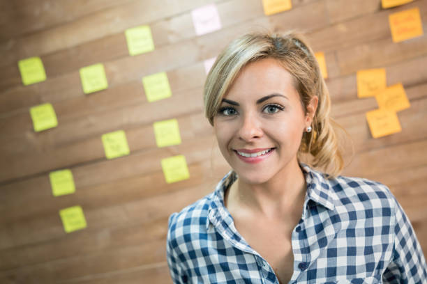 istock Portrait of a woman working at a co-working space 912338200