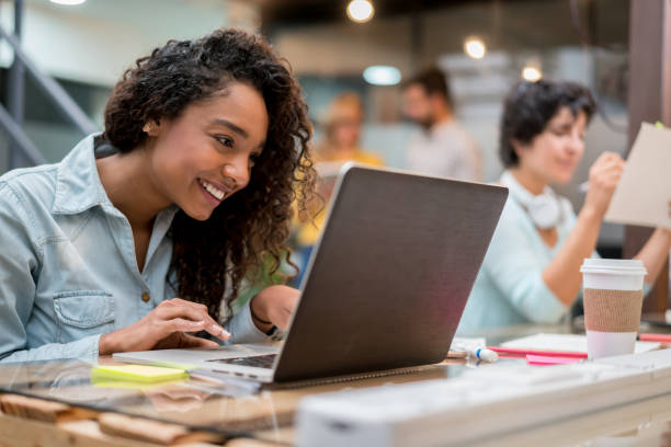 istock Casual business woman working online at a creative office 912338216