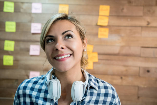 istock Thoughtful woman working at a creative office 912338284