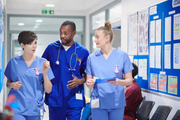 istock medical clinic team walking 912338644