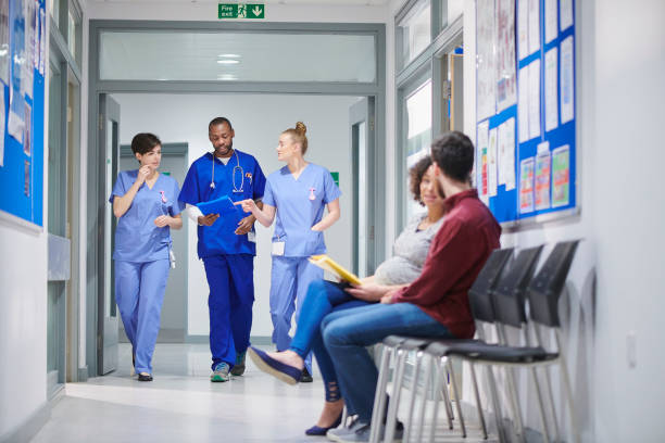 istock midwifery team walking to theatre 912340996