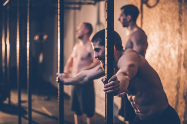 istock Friends standing in a gym 912342566