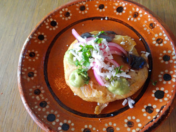 istock Mexican traditional corn gordita made filled with pork meat 912345286