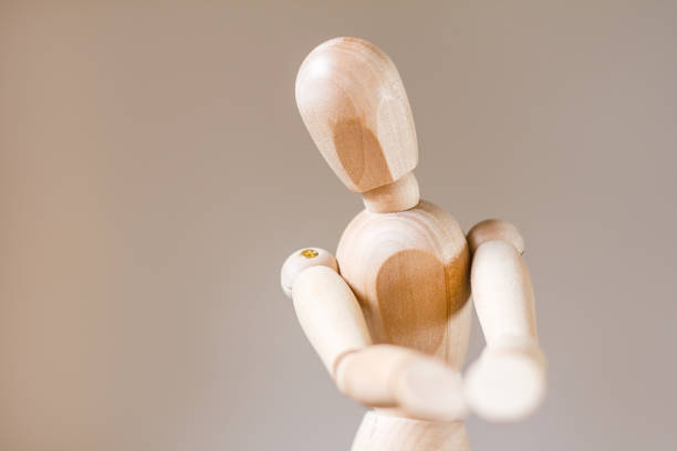 istock Wooden mannequin isolated on white background 912348610
