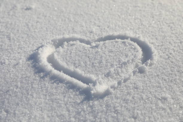istock Heart symbol on snow 912349260