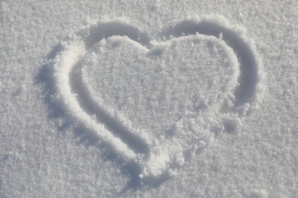 istock Heart sign on snow 912349284