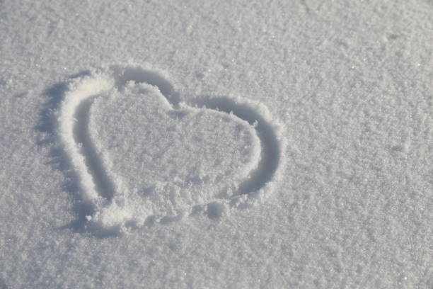 istock Heart symbol on fresh snow 912349436
