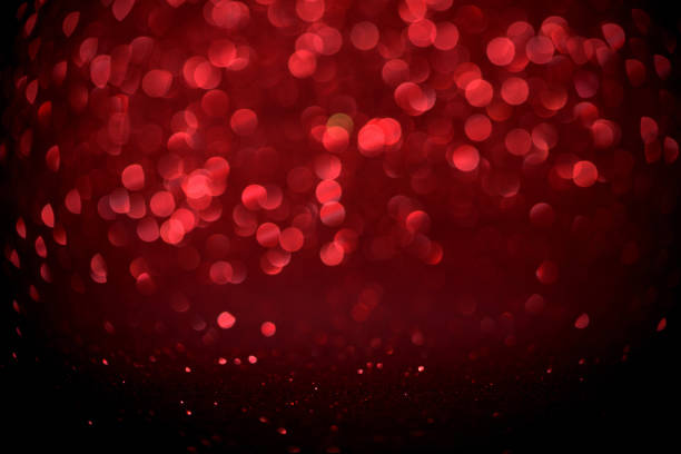 istock red glitter bokeh lights Blurred abstract background for Valentines, birthday, anniversary, wedding, new year and Christmas 912349716