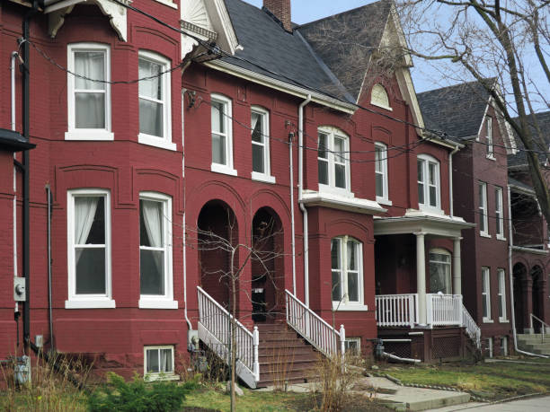 istock Victorian style row houses with gables 912356764