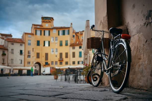 Piazza dell Anfiteatro in Lucca Italy with bike