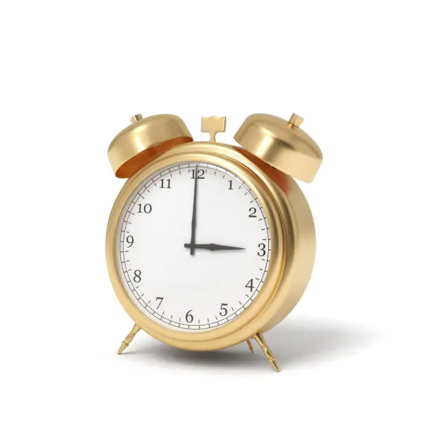 Photo of 3d rendering of a retro alarm clock covered in gold standing on a white background