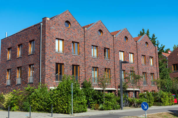 Row houses made of red bricks Row houses made of red bricks seen in Berlin, Germany duplex photos stock pictures, royalty-free photos & images