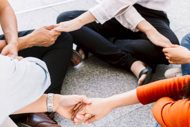 istock Group of team work people holding hands together.friendship concept 912374516