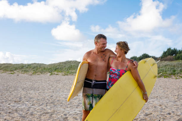 istock Australian Mature Age Surfing Couple 912381564