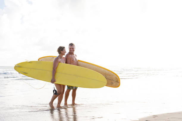 istock Australian Mature Age Surfing Couple 912381570