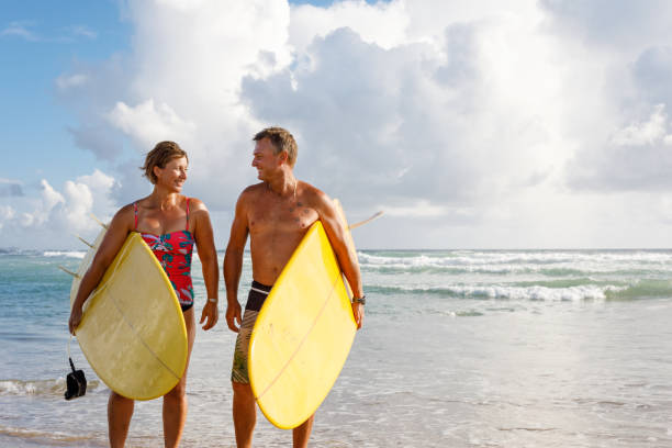 istock Australian Mature Age Surfing Couple 912381606