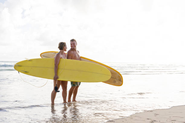 istock Australian Mature Age Surfing Couple 912381728
