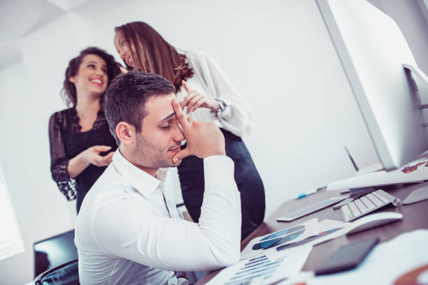istock Stressful Businessman with Headache when Receiving Many Complaints 912384532