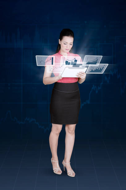 istock Caucasian businesswoman with virtual growth graphs 912384818