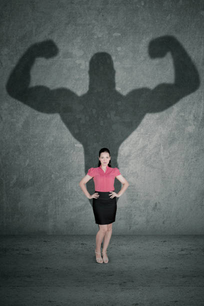 istock Female entrepreneur with her strong shadow 912388412