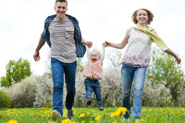 istock Happy family outdoors 912388880