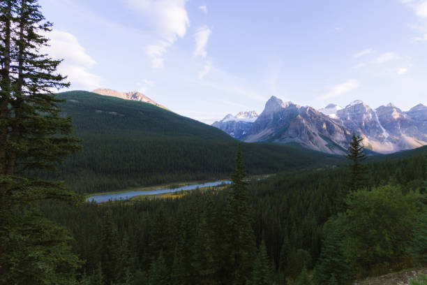 istock Scenic valley with river in Rocky Mountains in Canada during sunset 912393210