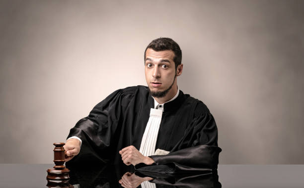 istock Oldscool young judge in gown 912394004