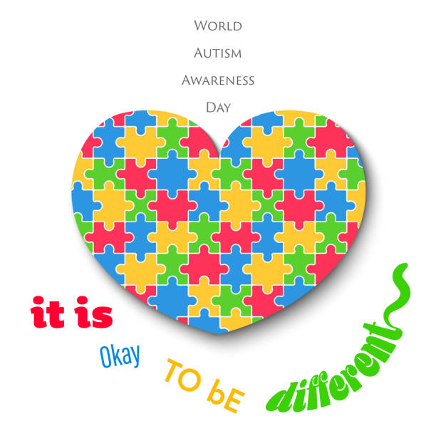 istock Colorful Jigsaw Heart on White Background Autism Day 912394454